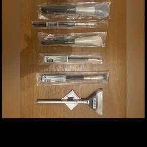 No offers! Brand name Cosmetics Brush Set - Black, White, and Silver.